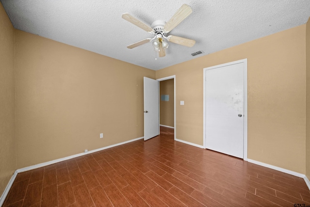 17607 Kristopher Cir, Whitehouse, TX 75791 - unfurnished bedroom featuring wood finished floors, ceiling fan, and a textured ceiling