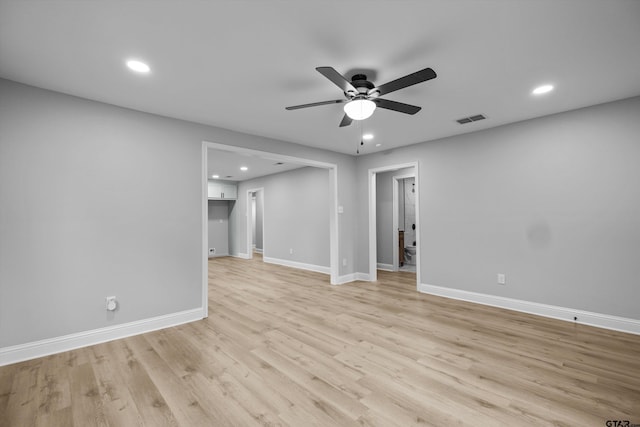 unfurnished room with light hardwood / wood-style flooring and ceiling fan