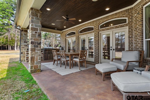 view of patio featuring french doors, ceiling fan, and area for grilling