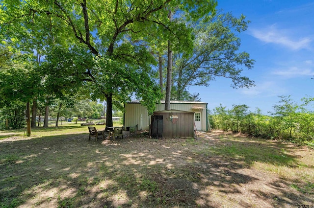 225 Springwood Cir, Chandler, TX 75758 - view of yard with an outdoor structure