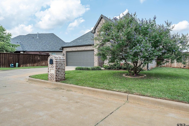 204 Providence Pl, Bullard, TX 75757 - view of front of property featuring concrete driveway, a garage, brick siding, and roof with shingles