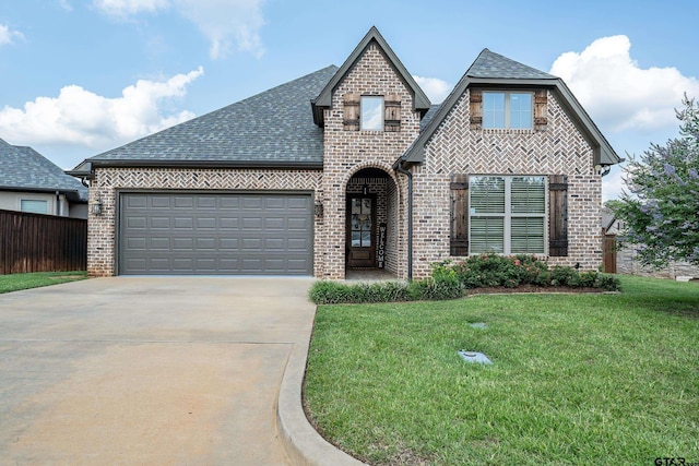 204 Providence Pl, Bullard, TX 75757 - french country style house featuring brick siding, roof with shingles, concrete driveway, and an attached garage