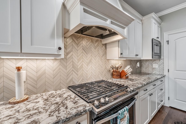 204 Providence Pl, Bullard, TX 75757 - kitchen with stainless steel appliances, custom range hood, light stone counters, white cabinets, and ornamental molding