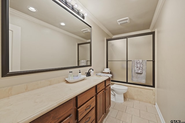 5298 Leaning Oaks Dr, Flint, TX 75762 - full bath with vanity, toilet, combined bath / shower with glass door, crown molding, and tile patterned floors