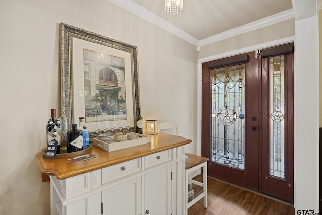 5298 Leaning Oaks Dr, Flint, TX 75762 - entryway featuring ornamental molding, wood finished floors, and a chandelier