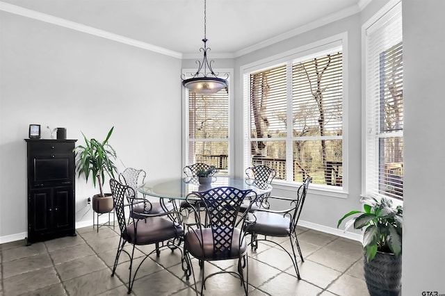 dining area featuring ornamental molding