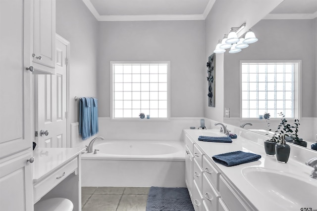 bathroom featuring vanity, crown molding, a washtub, and tile patterned floors