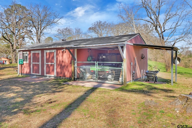 view of outdoor structure with a yard