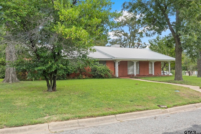 ranch-style house with a front yard