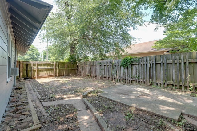 518 E Reagan St, Palestine, TX 75801 - fenced backyard featuring cooling unit
