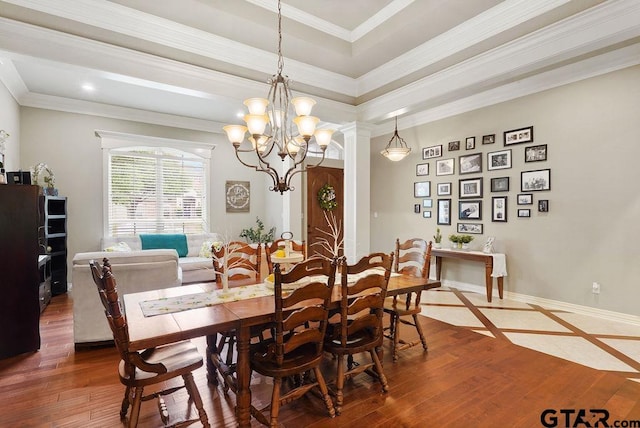 302 Coventry St, Bullard, TX 75757 - dining area with dark wood finished floors, a chandelier, and ornamental molding