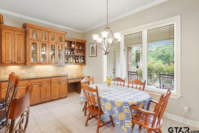 302 Coventry St, Bullard, TX 75757 - dining area with light tile patterned flooring, ornamental molding, and a chandelier