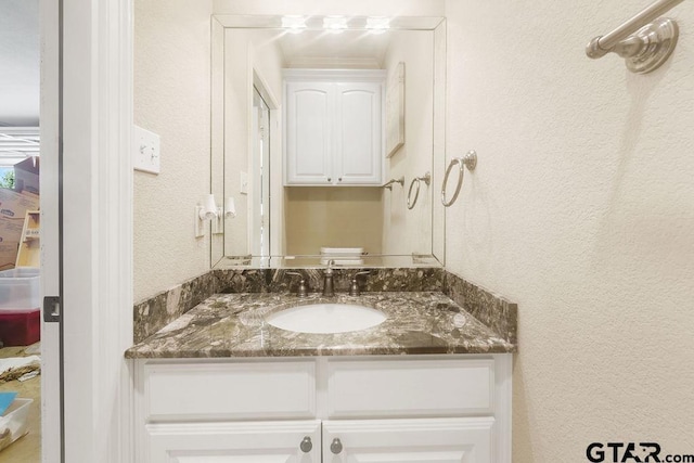 302 Coventry St, Bullard, TX 75757 - bathroom with vanity and a textured wall