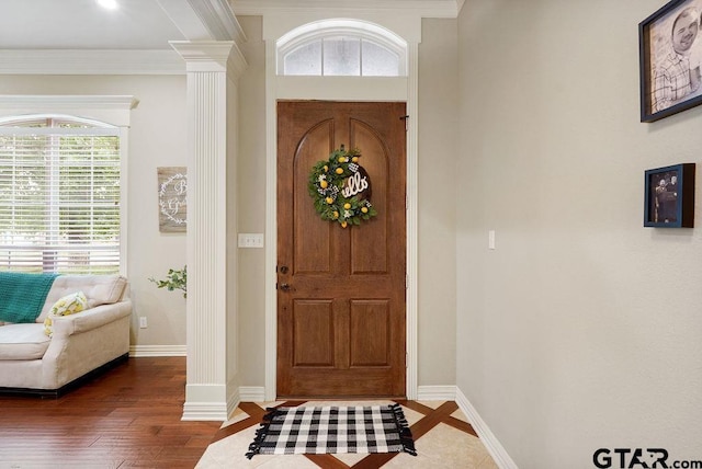 302 Coventry St, Bullard, TX 75757 - entryway with ornate columns, ornamental molding, and dark wood-type flooring