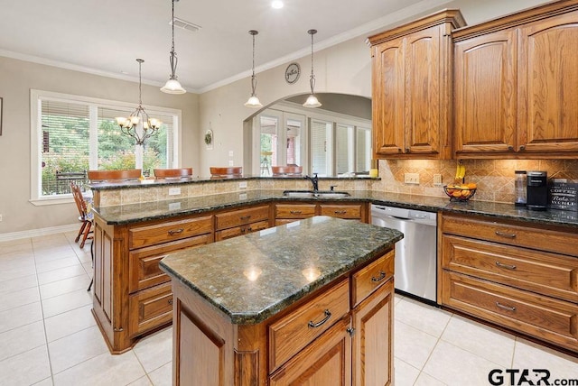 302 Coventry St, Bullard, TX 75757 - kitchen featuring stainless steel dishwasher, light tile patterned floors, backsplash, brown cabinets, and crown molding