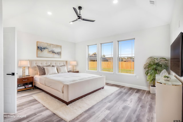 2062 County Road 1612, Alba, TX 75410 - bedroom with light wood-style flooring, lofted ceiling, baseboards, and recessed lighting