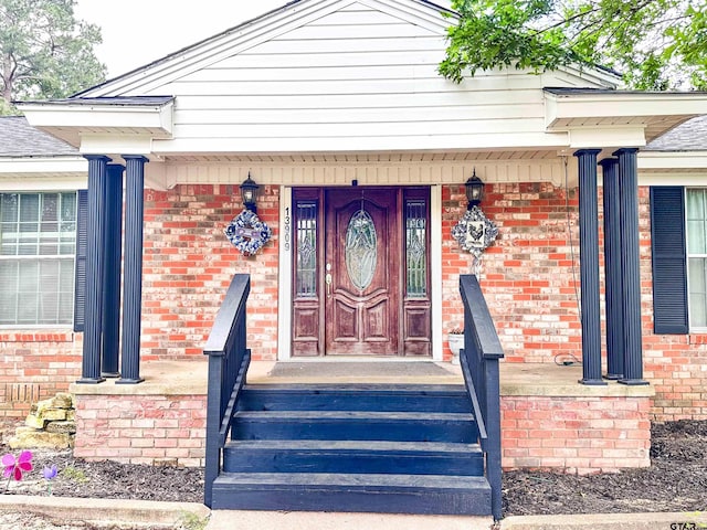 13909 Joe B Fulgham Cir, Brownsboro, TX 75756 - property entrance featuring brick siding and covered porch