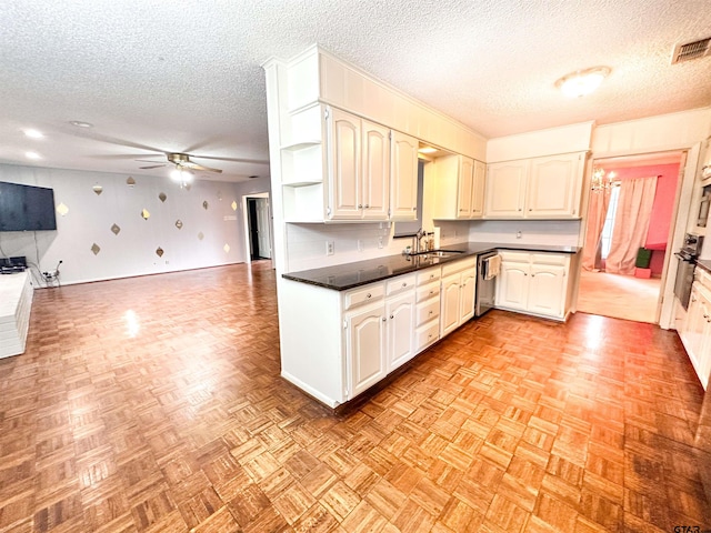 13909 Joe B Fulgham Cir, Brownsboro, TX 75756 - kitchen with a textured ceiling, a sink, ceiling fan, dark countertops, and open floor plan
