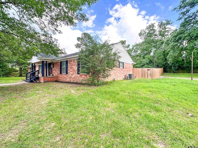 13909 Joe B Fulgham Cir, Brownsboro, TX 75756 - view of front of property featuring brick siding and cooling unit