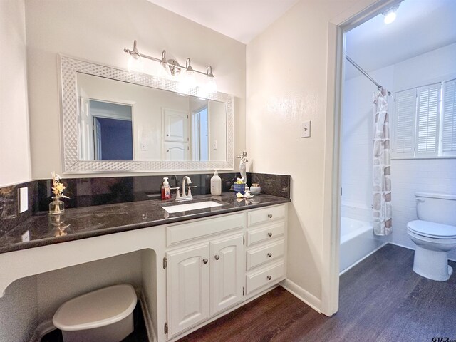 13909 Joe B Fulgham Cir, Brownsboro, TX 75756 - full bathroom featuring wood finished floors, toilet, vanity, and shower / bath combo