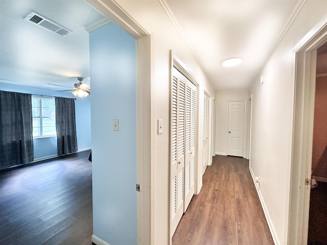 13909 Joe B Fulgham Cir, Brownsboro, TX 75756 - corridor with wood finished floors, baseboards, and ornamental molding