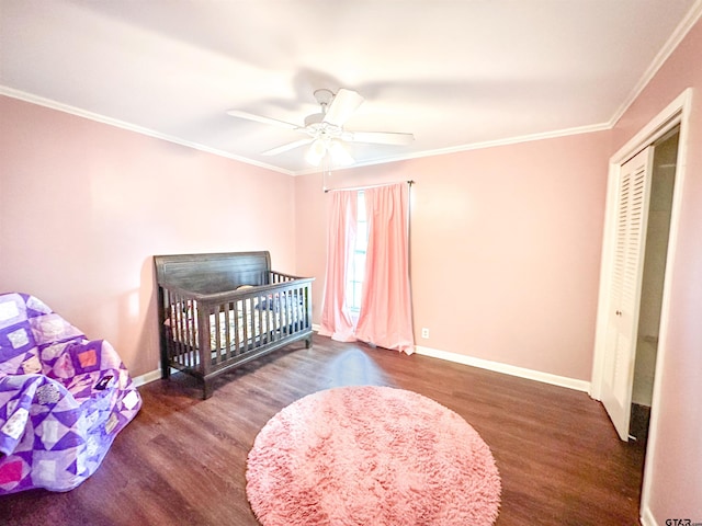 13909 Joe B Fulgham Cir, Brownsboro, TX 75756 - bedroom with wood finished floors, baseboards, ornamental molding, ceiling fan, and a closet