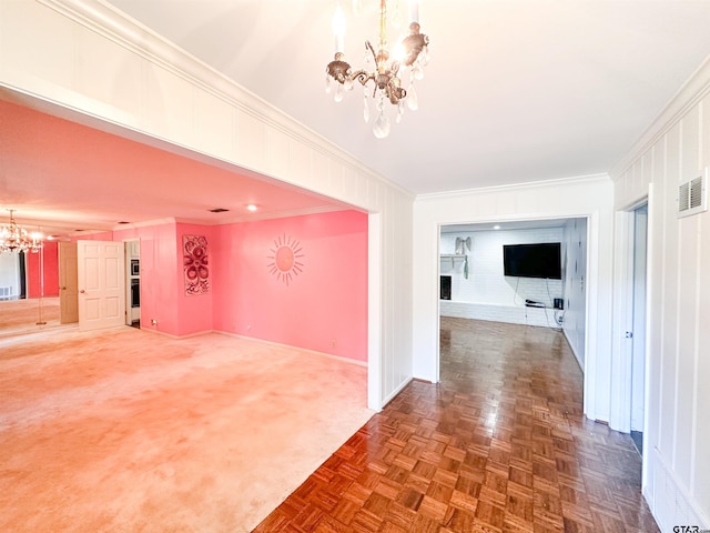 13909 Joe B Fulgham Cir, Brownsboro, TX 75756 - corridor with a chandelier, crown molding, baseboards, and carpet floors
