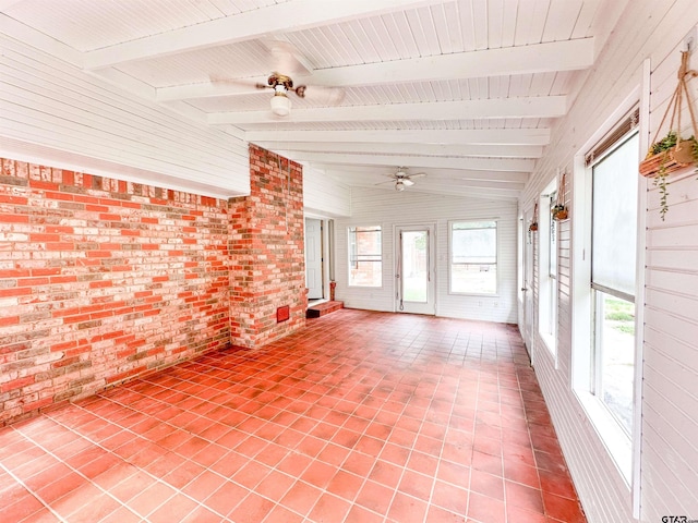 13909 Joe B Fulgham Cir, Brownsboro, TX 75756 - unfurnished sunroom featuring brick wall, plenty of natural light, and tile patterned floors