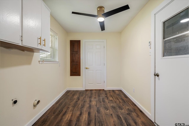 laundry area featuring ceiling fan, dark hardwood / wood-style flooring, hookup for an electric dryer, and cabinets