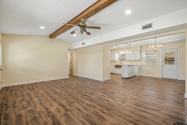 unfurnished living room featuring lofted ceiling with beams, dark wood-type flooring, sink, and ceiling fan with notable chandelier