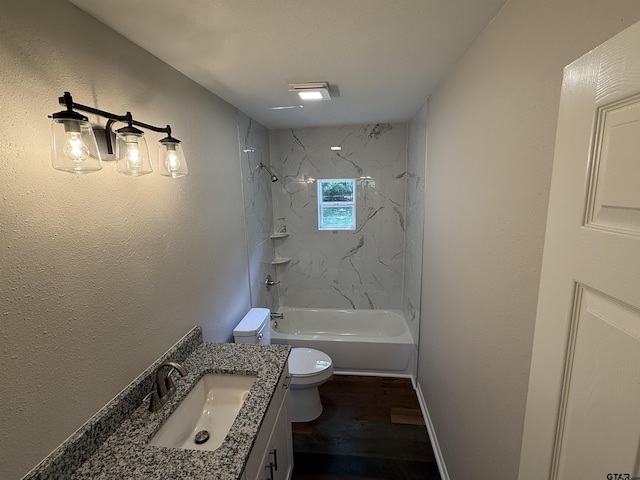 2533 Chelsea Dr, Tyler, TX 75701 - bathroom with vanity, wood finished floors, and bathtub / shower combination