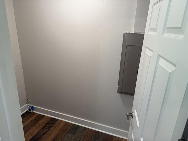 2533 Chelsea Dr, Tyler, TX 75701 - laundry room with dark wood-type flooring and electric panel