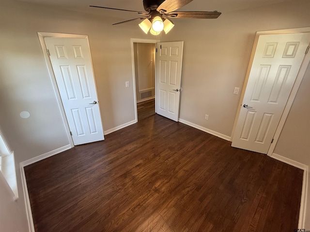 2533 Chelsea Dr, Tyler, TX 75701 - unfurnished bedroom featuring dark wood-type flooring and ceiling fan