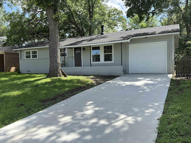 2533 Chelsea Dr, Tyler, TX 75701 - ranch-style home featuring an attached garage, brick siding, driveway, and a shingled roof