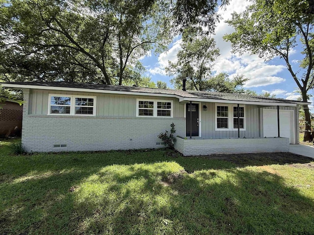 2533 Chelsea Dr, Tyler, TX 75701 - ranch-style home with brick siding, a garage, crawl space, a front lawn, and board and batten siding