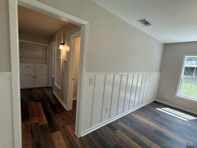 2533 Chelsea Dr, Tyler, TX 75701 - hallway with dark wood-style flooring