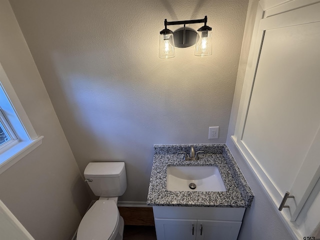 2533 Chelsea Dr, Tyler, TX 75701 - half bathroom featuring toilet and vanity