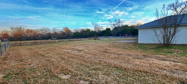 view of yard with a rural view