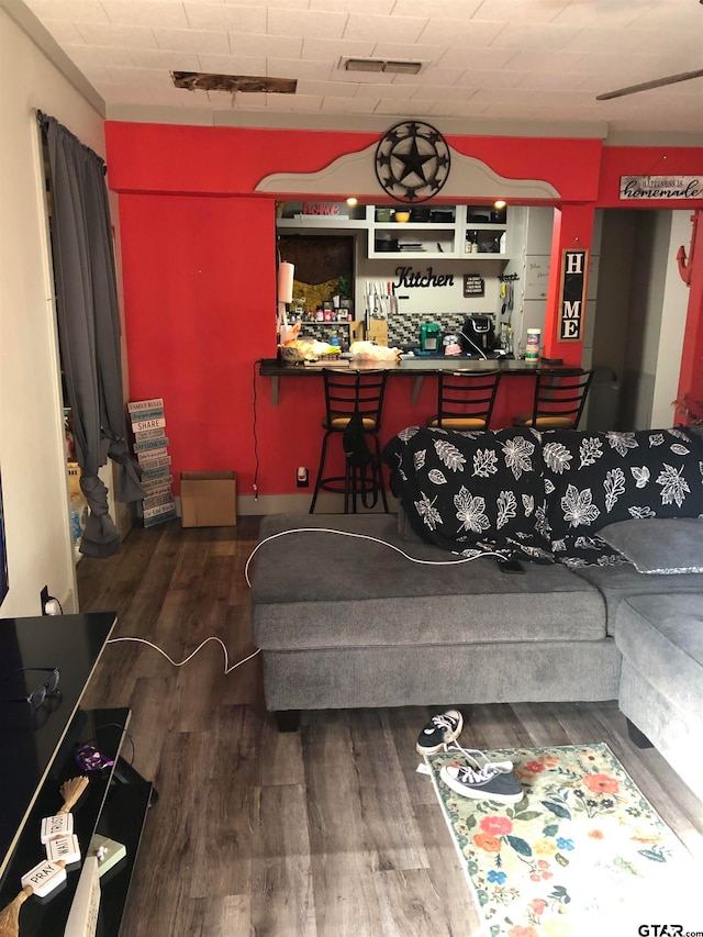 living room with dark wood-type flooring