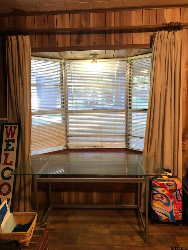 dining room with dark wood-type flooring