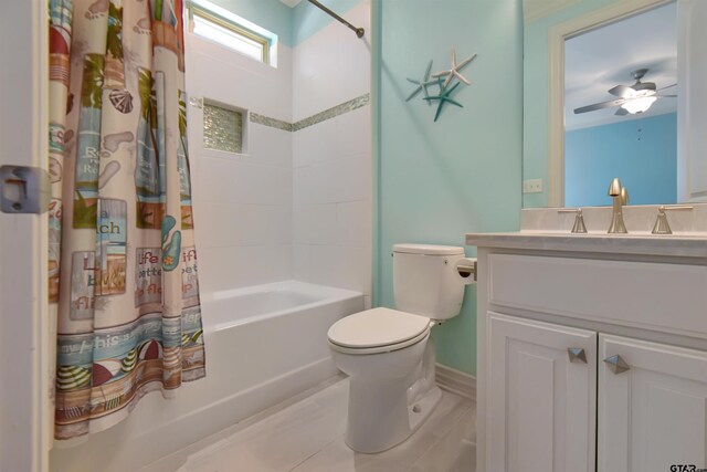 full bathroom featuring shower / tub combo, tile patterned floors, vanity, ceiling fan, and toilet