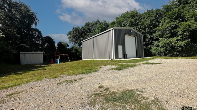 view of outbuilding featuring a garage