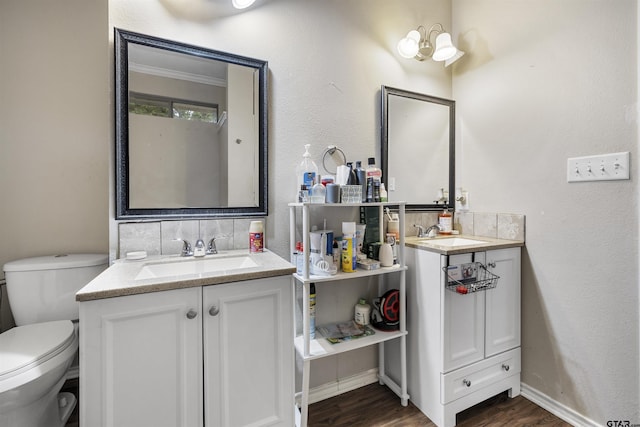 18313 Highmeadow Cir, Flint, TX 75762 - bathroom featuring vanity, wood finished floors, toilet, and baseboards