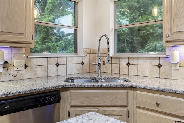 18313 Highmeadow Cir, Flint, TX 75762 - kitchen featuring stainless steel dishwasher, a sink, light stone counters, backsplash, and light brown cabinetry