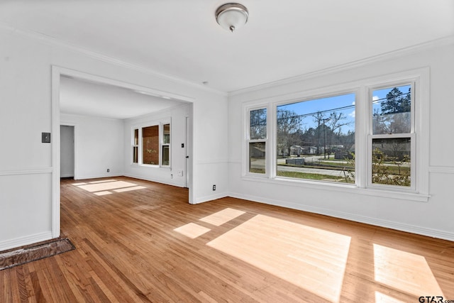 2444 Sunnybrook Dr, Tyler, TX 75701 - interior space with crown molding, plenty of natural light, and light hardwood / wood-style flooring
