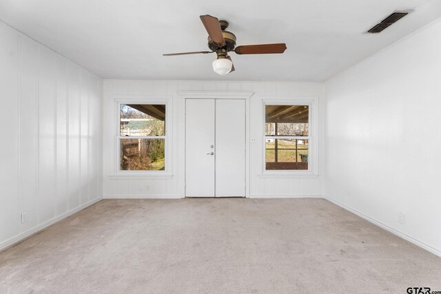 2444 Sunnybrook Dr, Tyler, TX 75701 - carpeted spare room with ceiling fan