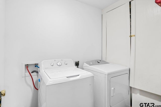 1131 E Commerce St, Tyler, TX 75702 - laundry area featuring washing machine and clothes dryer