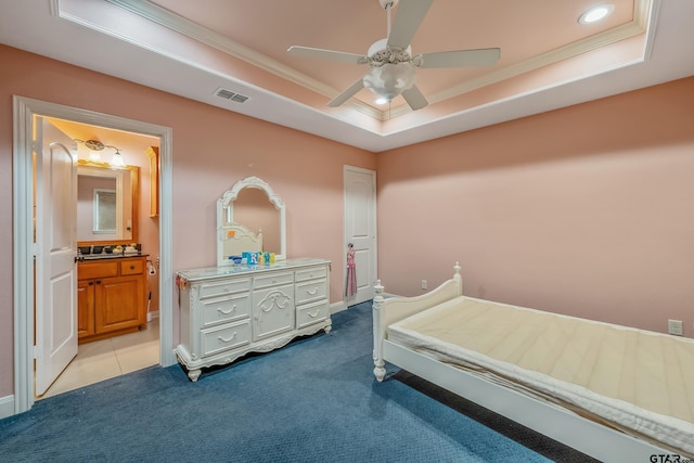 3072 Yasmeen Cir, Flint, TX 75762 - bedroom featuring a tray ceiling, crown molding, light carpet, a sink, and ensuite bath