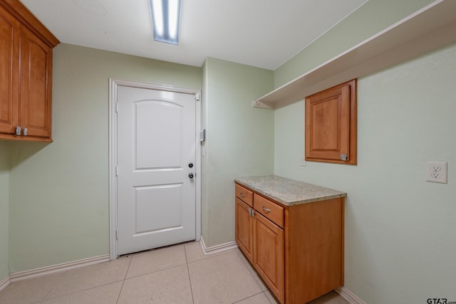 3072 Yasmeen Cir, Flint, TX 75762 - clothes washing area with baseboards and light tile patterned flooring