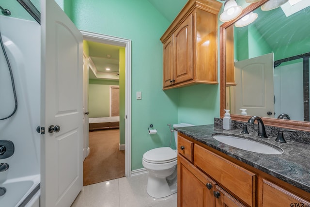 3072 Yasmeen Cir, Flint, TX 75762 - bathroom with toilet, tile patterned floors, vanity, baseboards, and vaulted ceiling